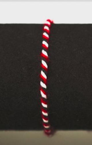 Polaris’ Secrets: Tridatu Balinese Bracelet for Protection - Red & White Striped Cultural Accessory with Balinese Traditions and Protective Properties