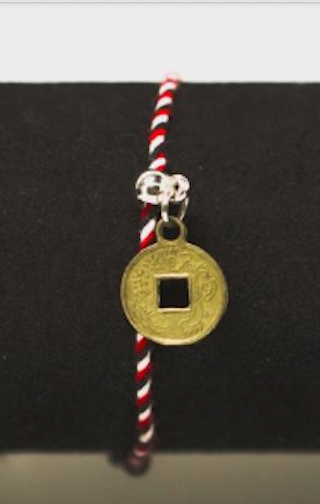 Polaris’ Secrets: Tridatu Balinese Bracelet for Protection - Red & White Striped Cultural Accessory with Balinese Traditions and Protective Properties