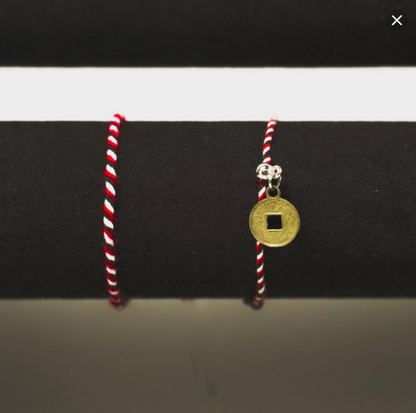 Polaris’ Secrets: Tridatu Balinese Bracelet for Protection - Red &amp; White Striped Cultural Accessory with Balinese Traditions and Protective Properties